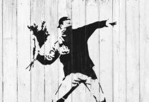 Banksy -The Anonymous Artist Who Turned Walls into Weapons